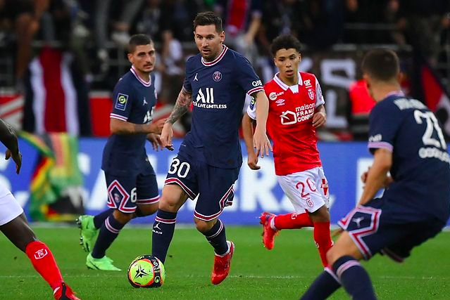 Mynd: (Scanpix) Lionel Messi í dysti fyri PSG móti Reims